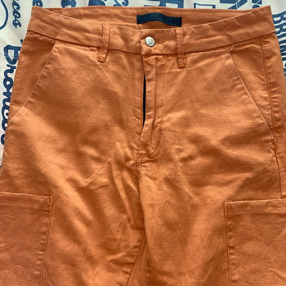 Medium-Small fit, orangey-tanish color <3